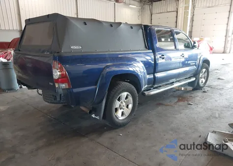 2014 Toyota Tacoma Base V6 z USA, uszkodzony, nr VIN 3TMMU4FN5EM070047